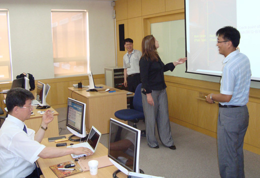 Trainer Elena Novitskaya analyzes a trainee's project Trainer Elena Novitskaya analyzes a trainee's project
